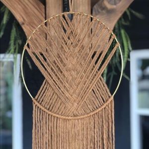 Brown macrame tapestry on gold hoop